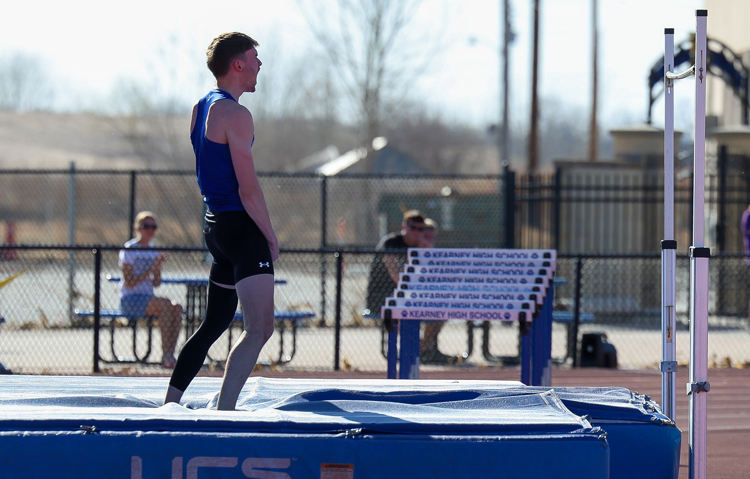 UNK junior Nolan Studley celebrates after breaking the school record in the outdoor high jump.