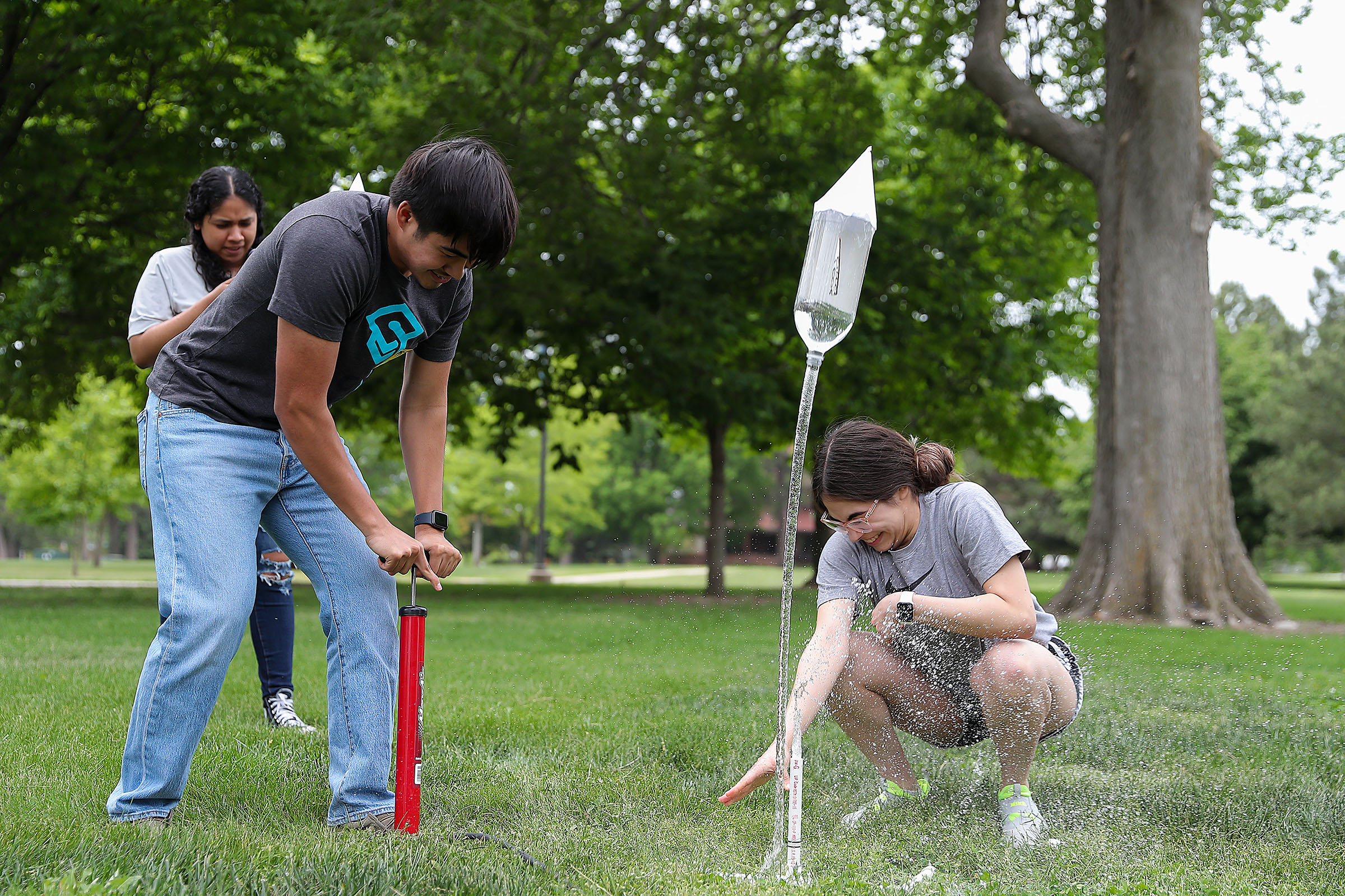 Students launch a water rocket during the Quest for Understanding Astronomy, Science and Research summer camp.