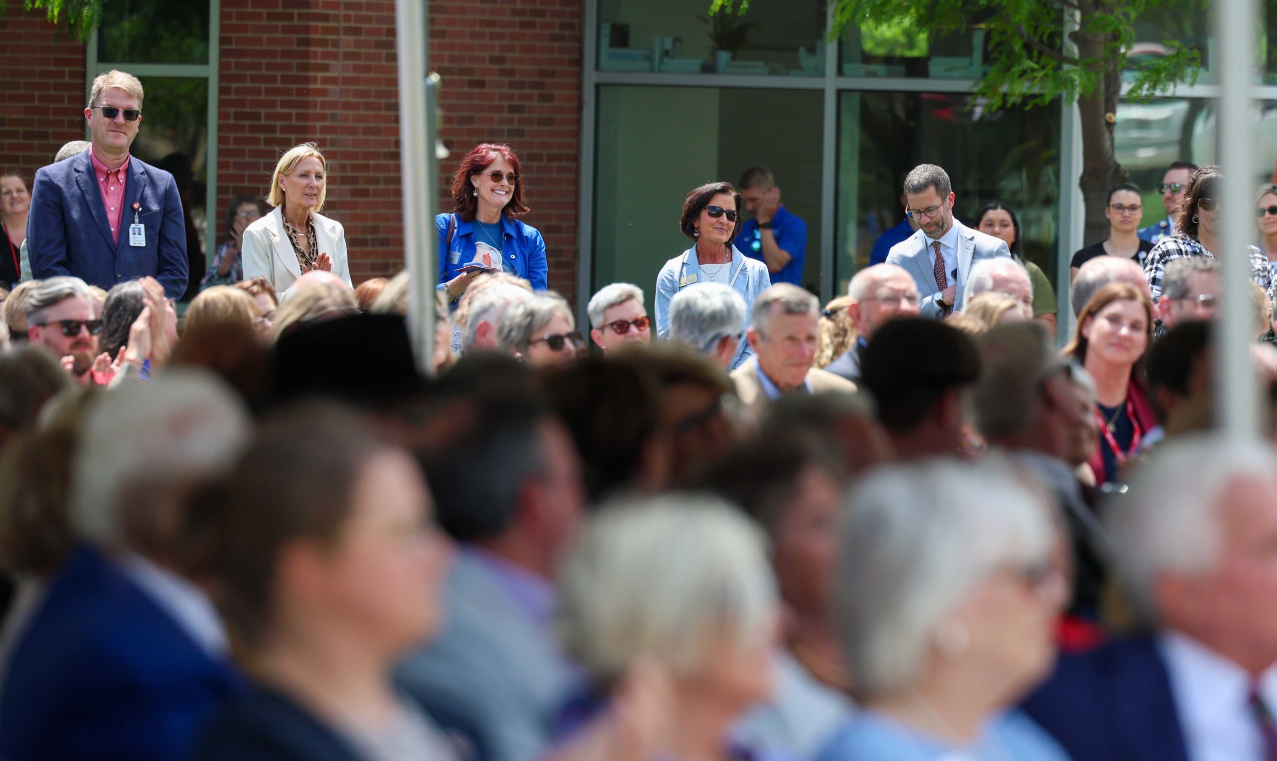 A large crowd attends the Douglas A. Kristensen Rural Health Education Complex grand opening ceremony.
