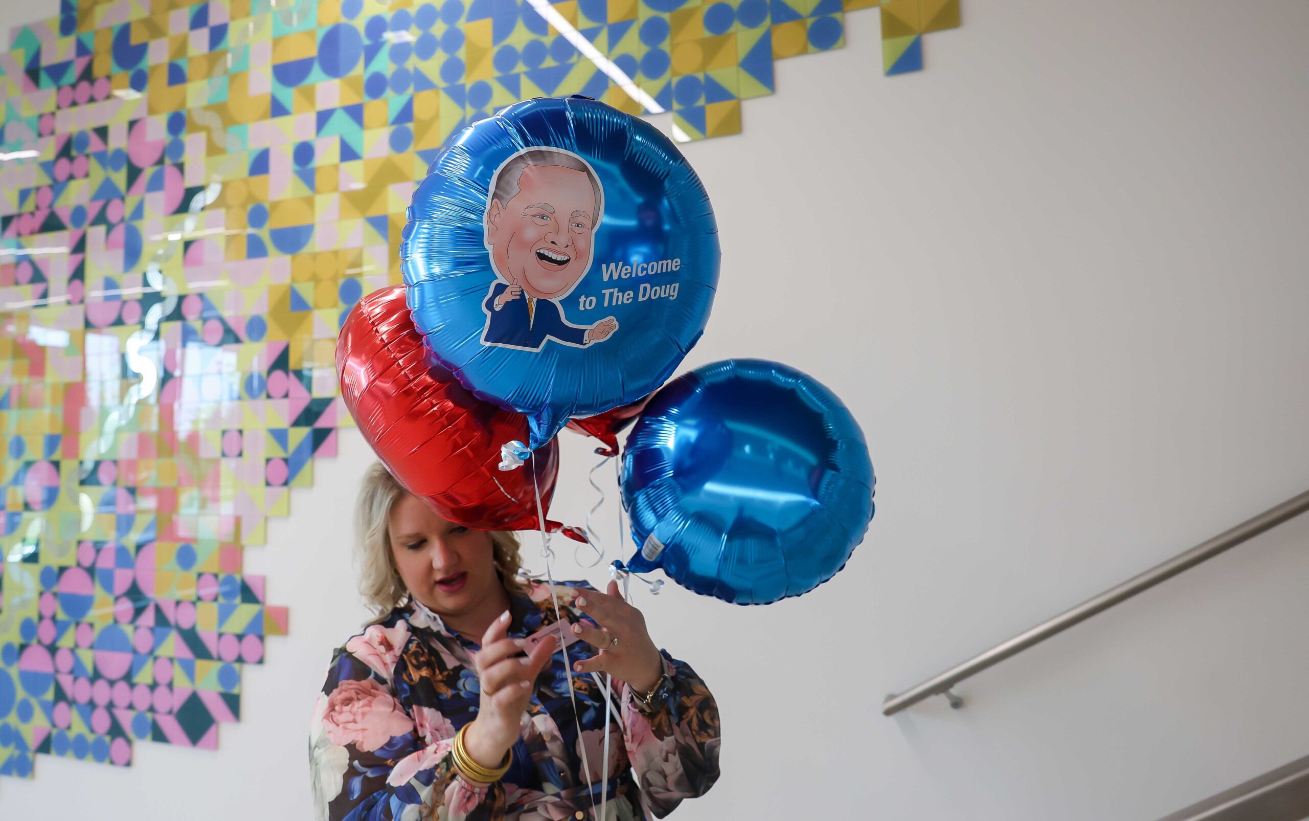 A "Welcome to The Doug" balloon celebrating Doug Kristensen's role in the development of the Rural Health Education Complex.