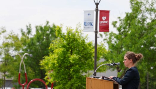 UNMC assistant professor Ellie Miller speaks during the Douglas A. Kristensen Rural Health Education Complex grand opening celebration.