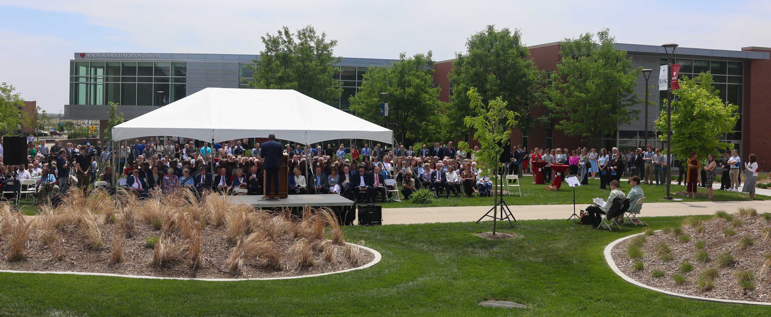 A large crowd attends the Douglas A. Kristensen Rural Health Education Complex grand opening ceremony.