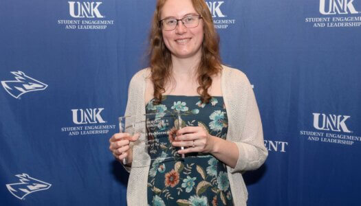 Rachel Feddersen receives the Sorority Advisor of the Year Award.