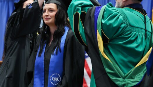 More than 700 students earn undergraduate and graduate at UNK's commencement ceremony.