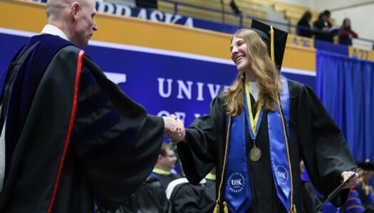 More than 700 students earn undergraduate and graduate at UNK's commencement ceremony.