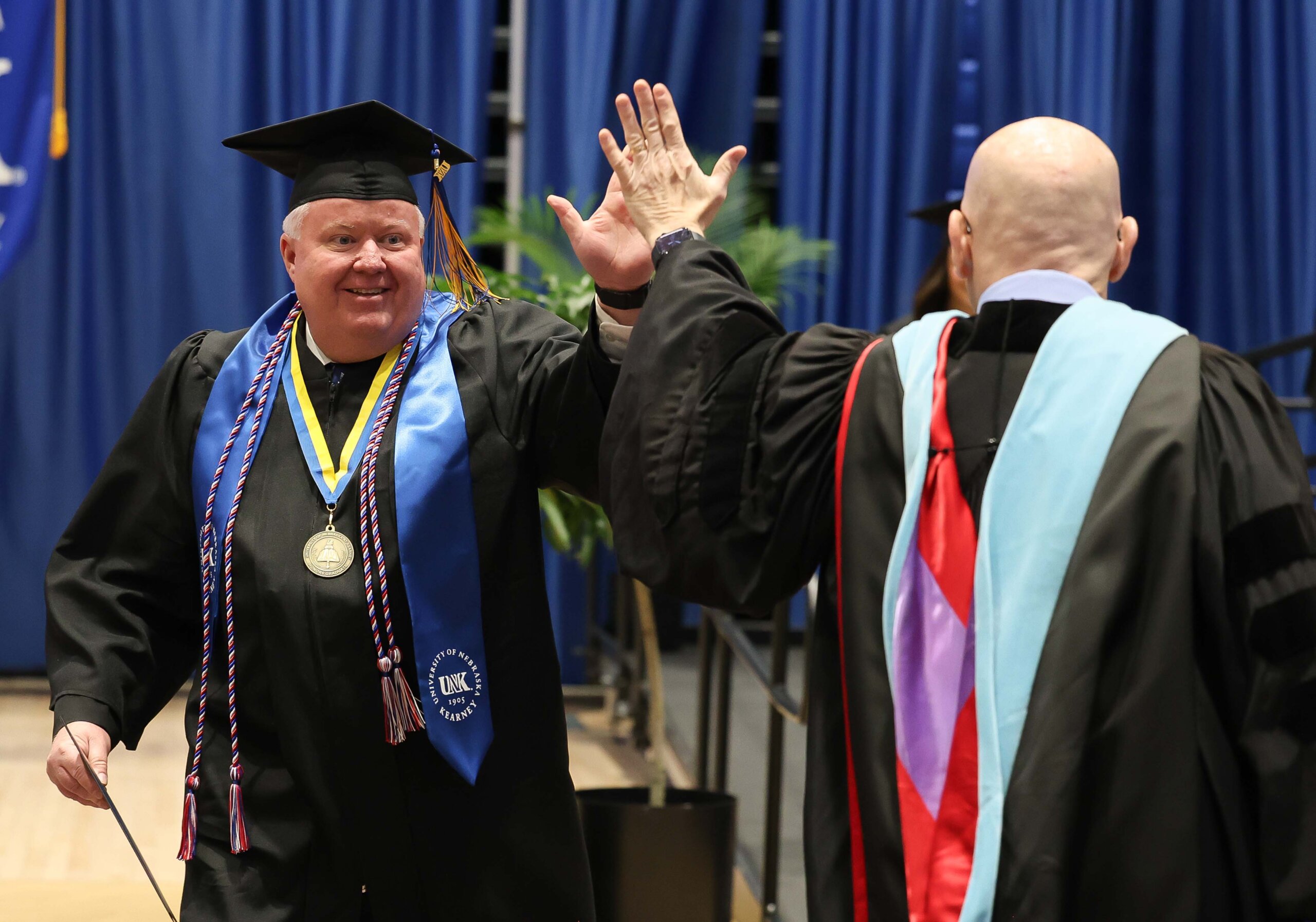 More than 700 students earn undergraduate and graduate degrees at UNK's commencement ceremony.