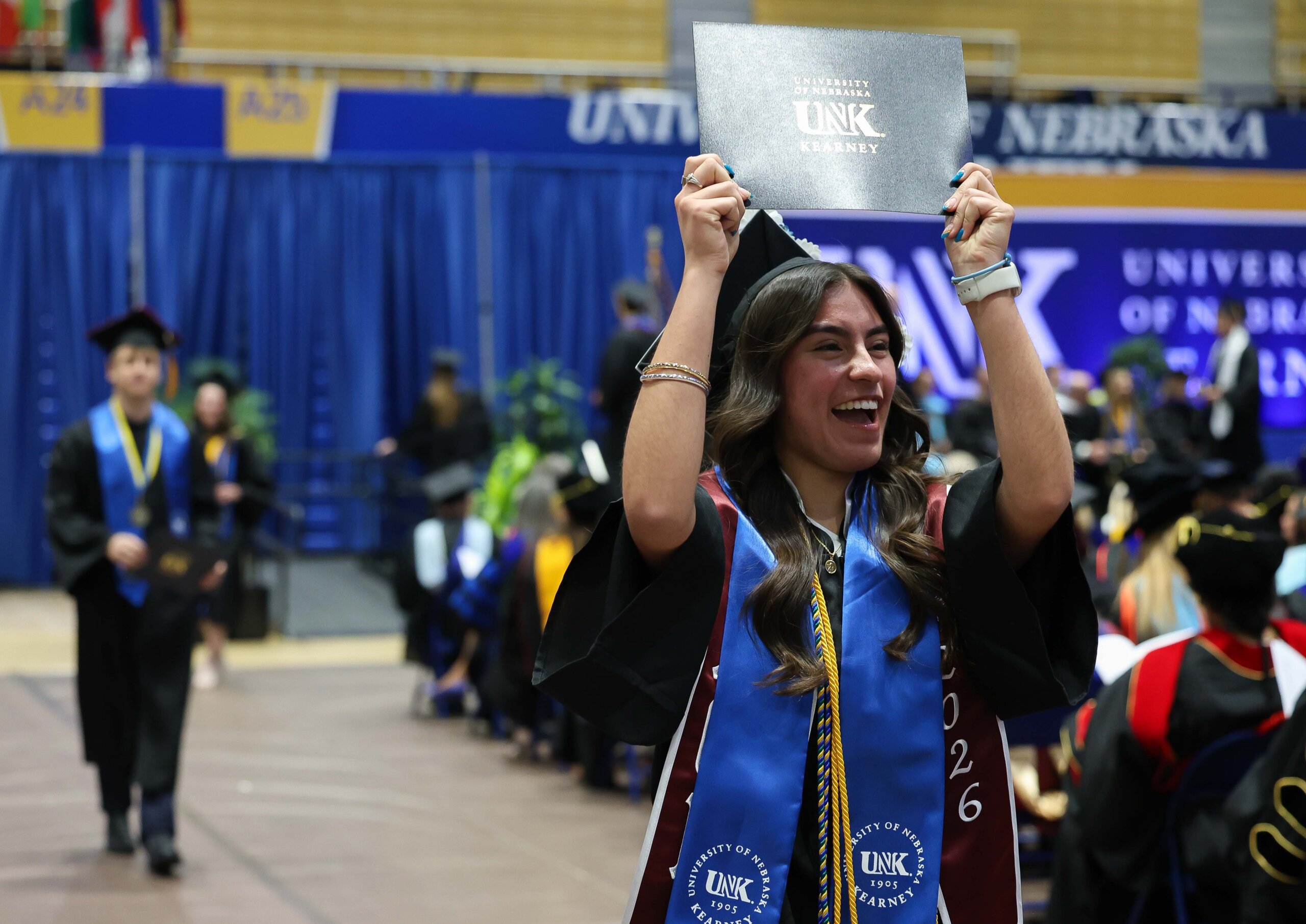 More than 700 students earn undergraduate and graduate degrees at UNK's commencement ceremony.