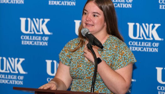 KTOM Scholarship recipient and recent UNK graduate Tracy Roskop speaks during Monday's ceremony.