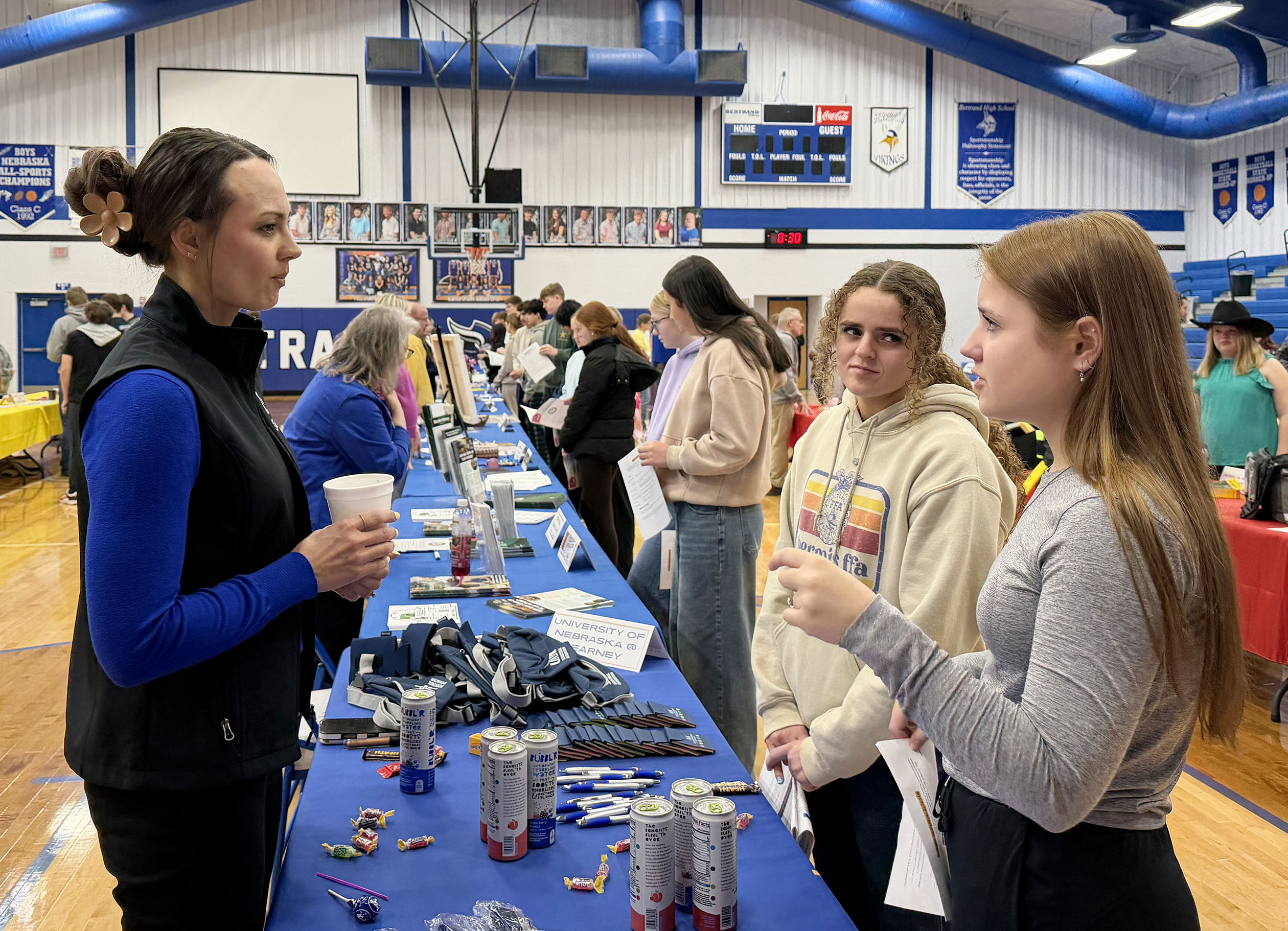Mandy Sand meets with students during a career fair at Bertrand Community School.