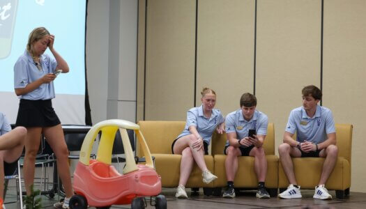 NSE leaders share campus resources through a skit.