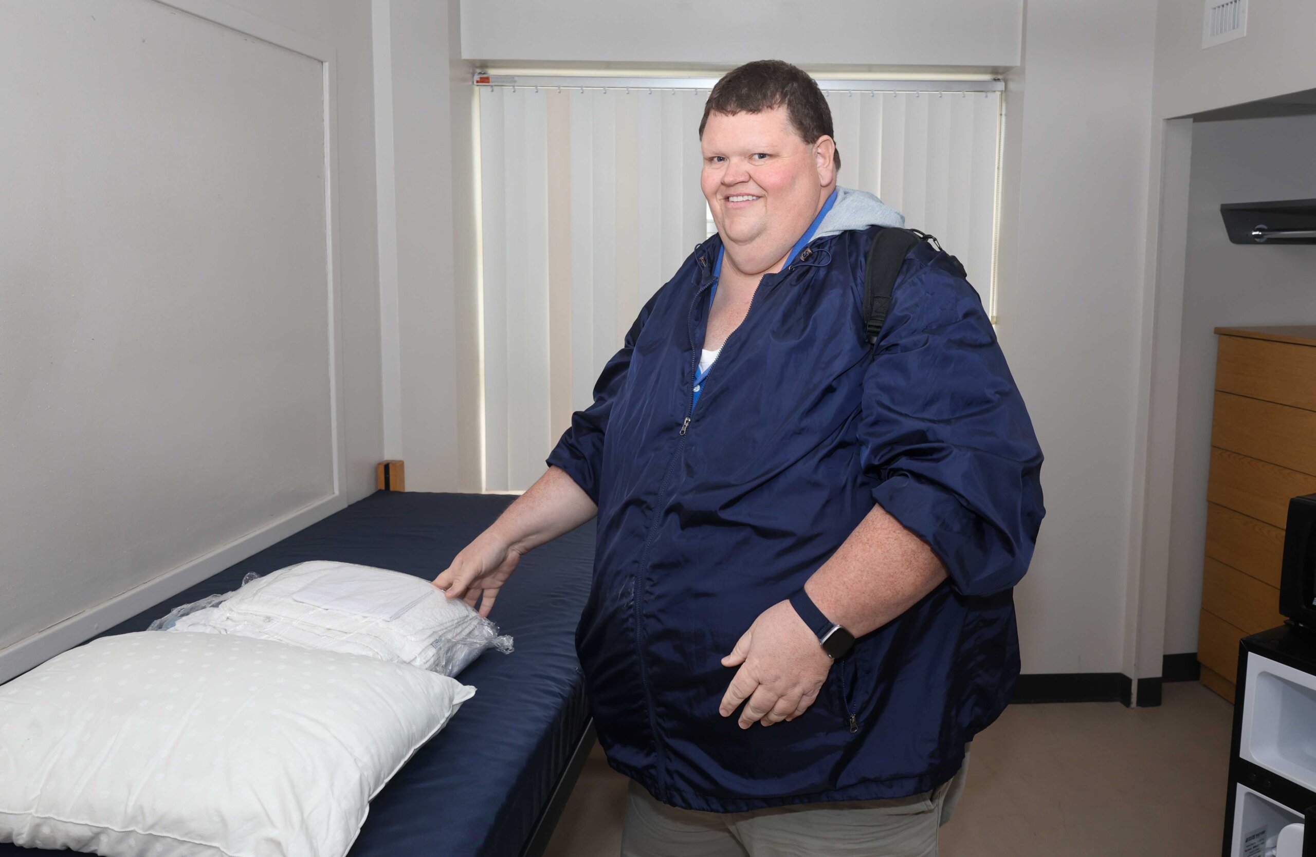 Matt Allbright poses for a photo inside a UNK residence hall.