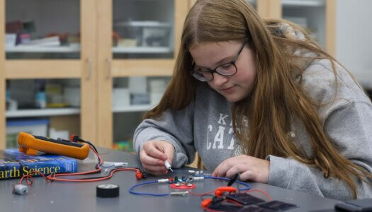 A student participates in an activity at the QUASAR Camp at UNK.