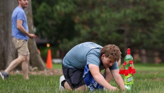 A student participates in an activity at the QUASAR Camp at UNK.