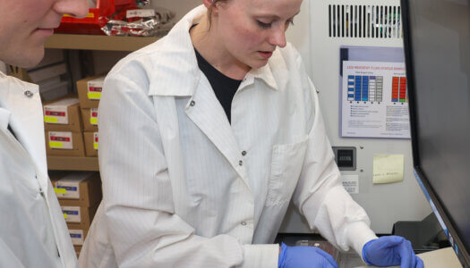 Lainey Wiedel, a medical laboratory technician at Mary Lanning Healthcare, shows UNK junior Rylan Nordby the microbiology lab during the Rural Immersion Program.