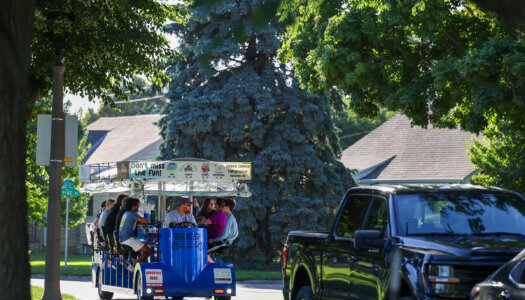 UNK students tour Hastings on an alcohol-free party bike.