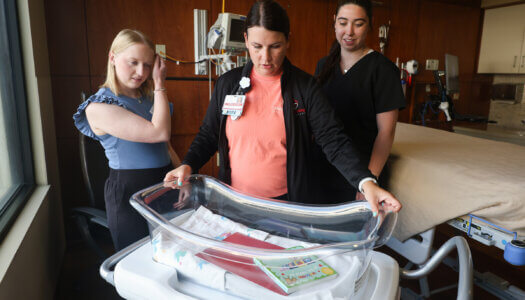 UNK students Danessa Buckles and Sarah Brott shadow in labor and delivery.