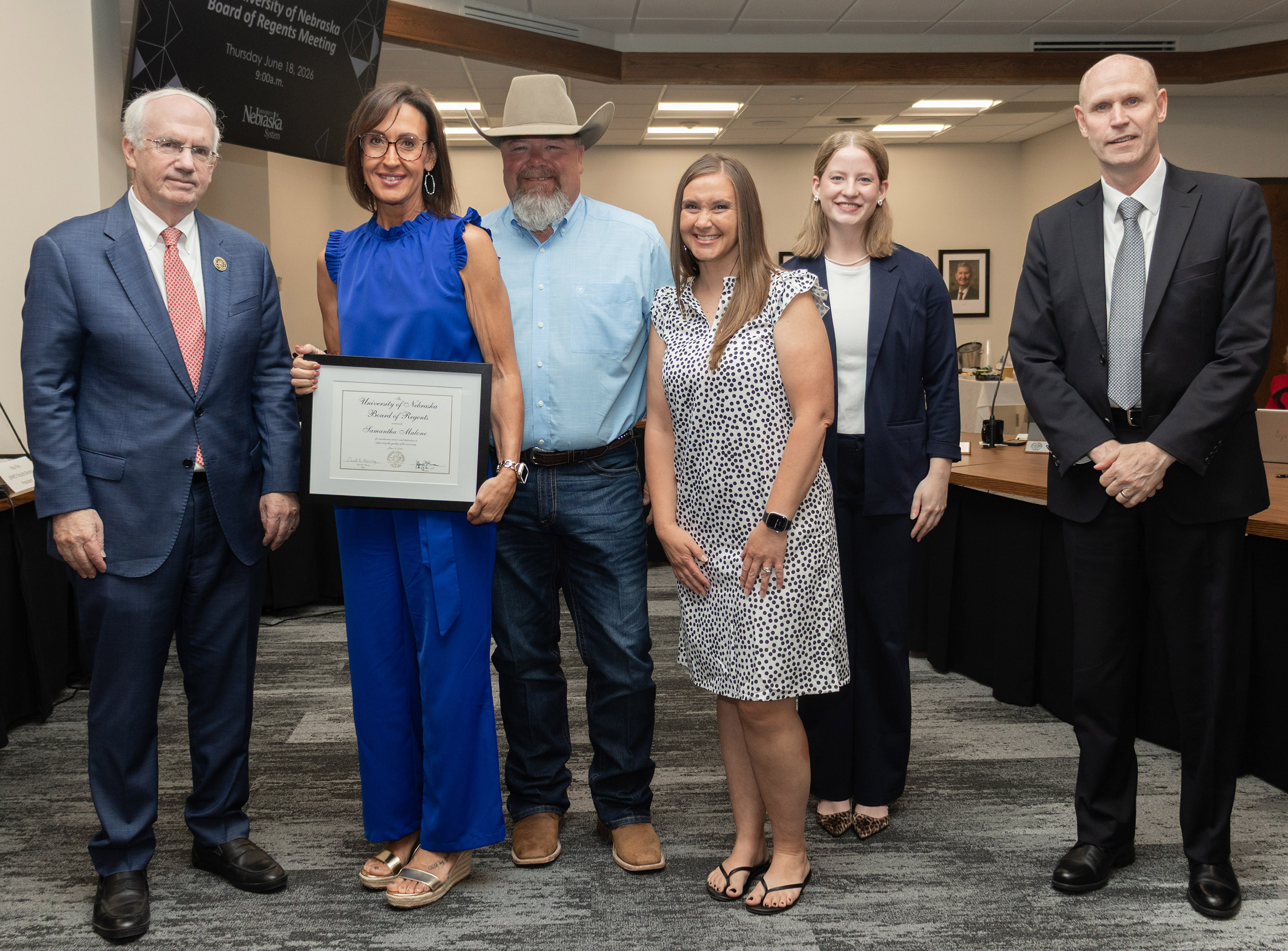 Samantha Malone receives the NU Board of Regents KUDOS award.