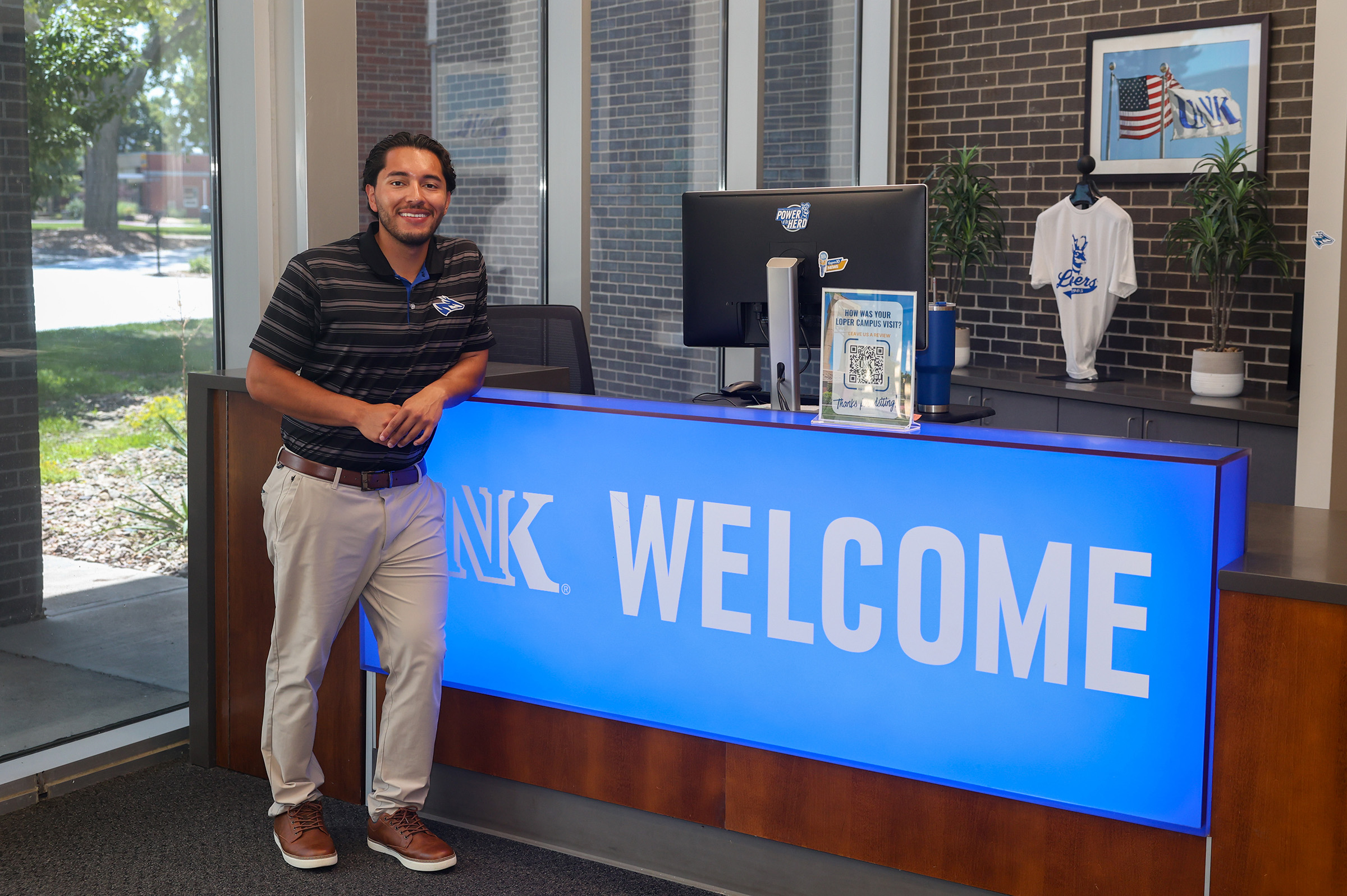 Erick Leiva Lopez poses for a photo in the UNK student union.
