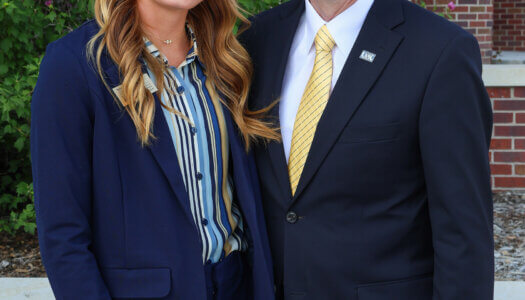 Jenna Rauert is pictured with UNK Chancellor Neal Schnoor.