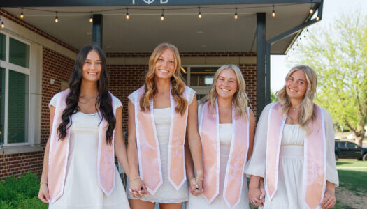 Jenna Rauert is pictured with her Gamma Phi Beta sisters.