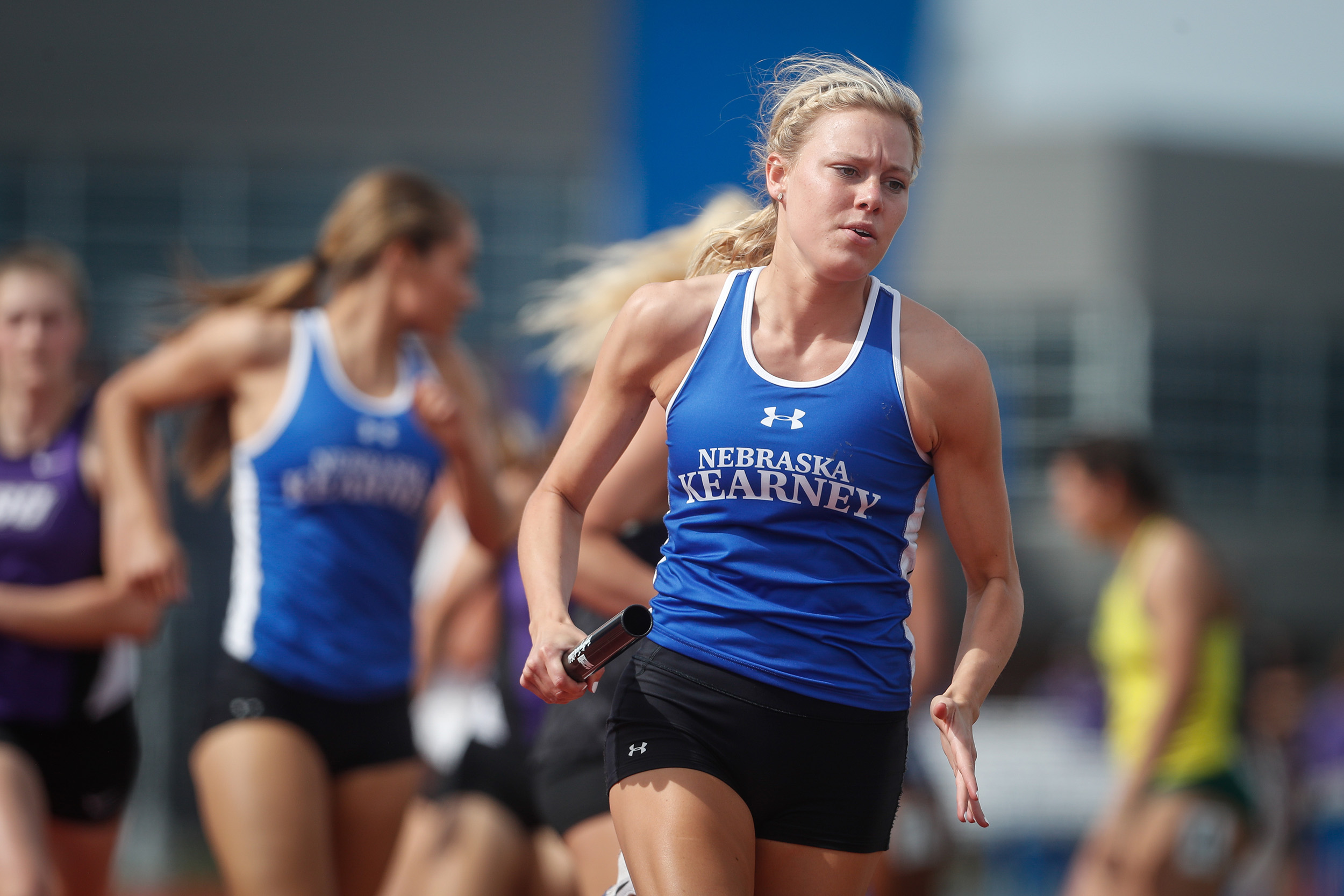 Jessica (Rauert) Huston competes for UNK track.