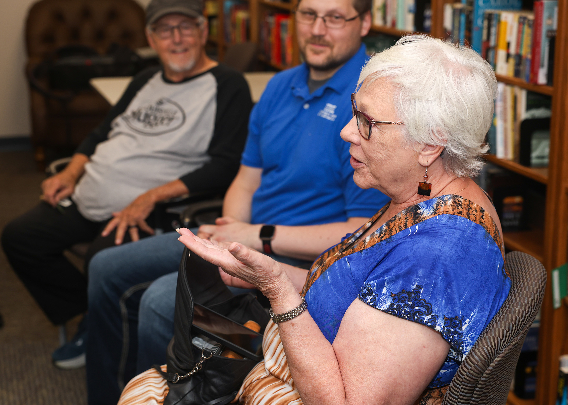 Kathleen Tschudin tells a story from her childhood during a weekly reminiscence therapy group meeting at the Peterson Senior Activity Center in Kearney.