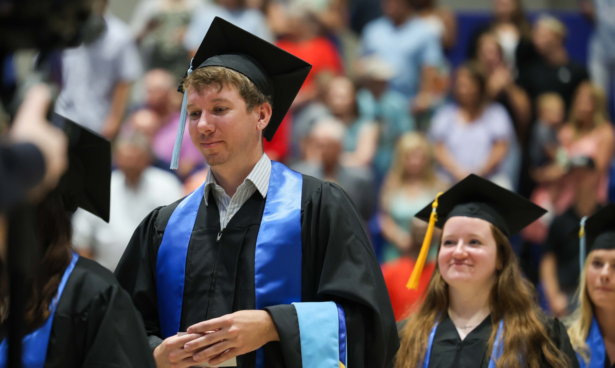 Students participate in summer commencement.