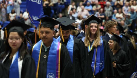 Students participate in summer commencement.