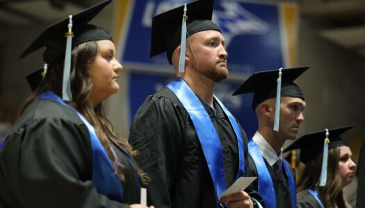 Students participate in summer commencement.