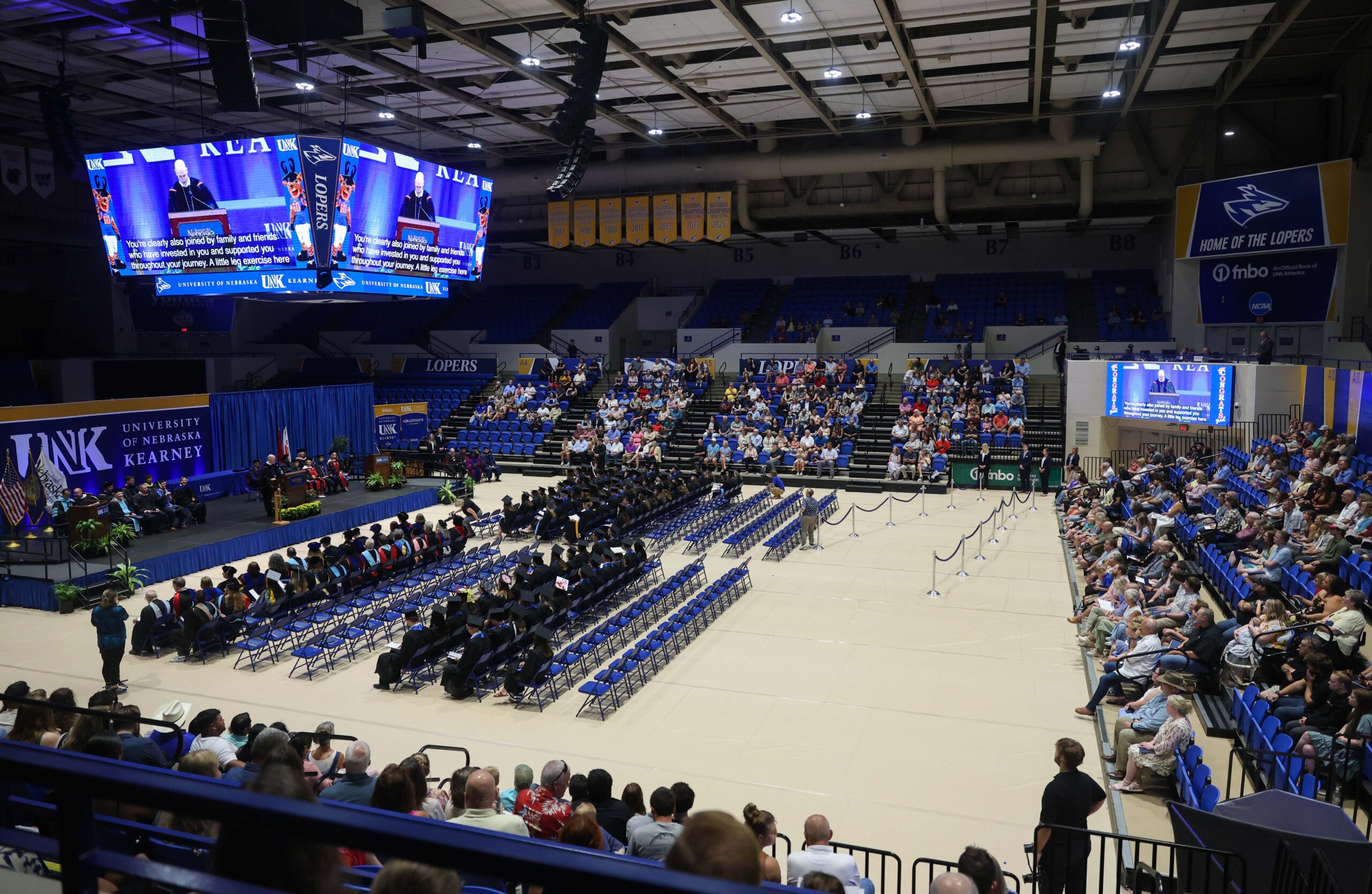 Students participate in summer commencement.