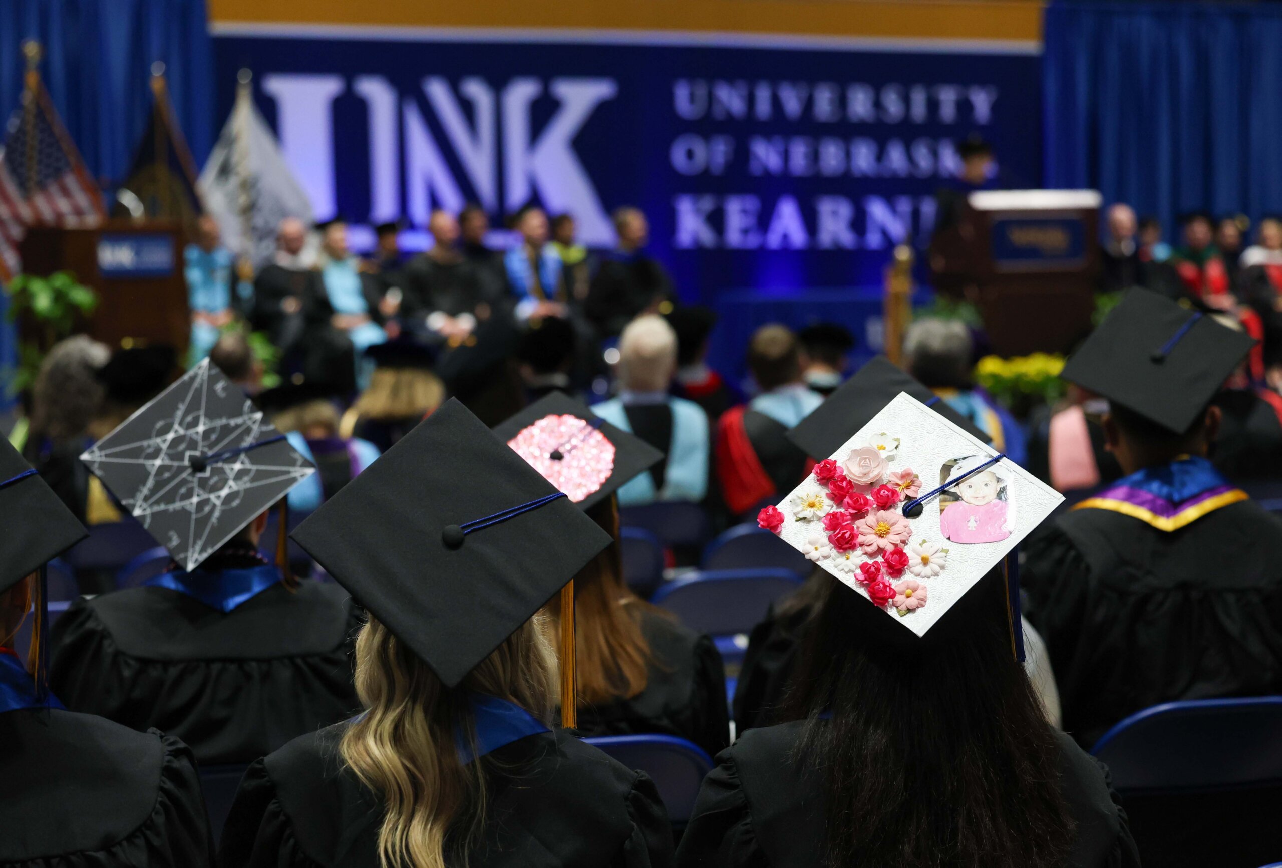 Students participate in summer commencement.