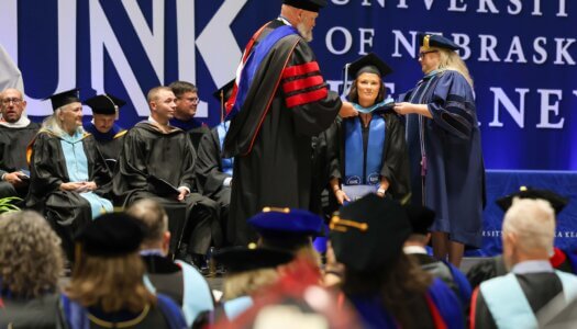 Students participate in summer commencement.
