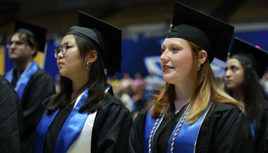 Students participate in summer commencement.