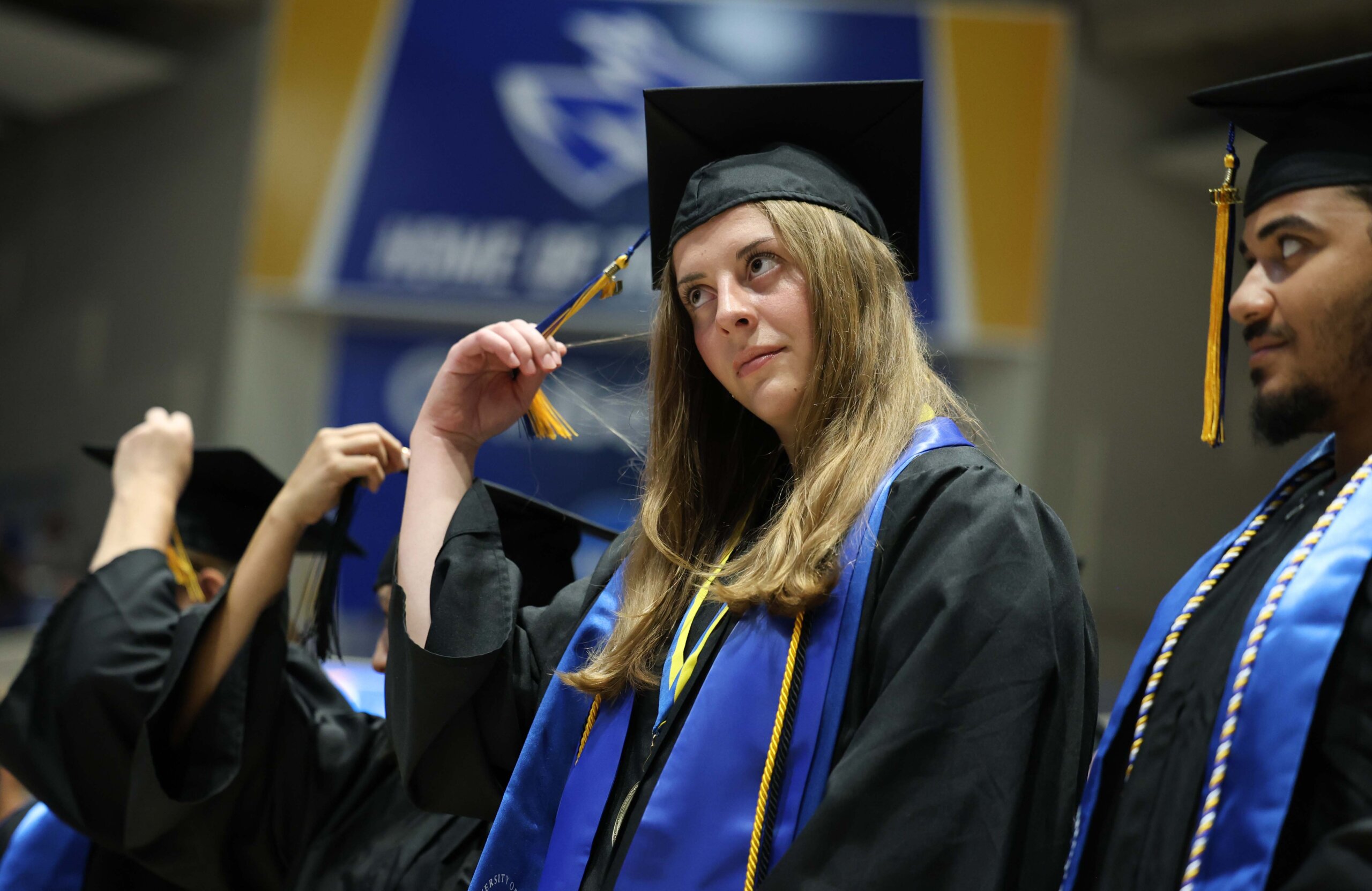Students participate in summer commencement.