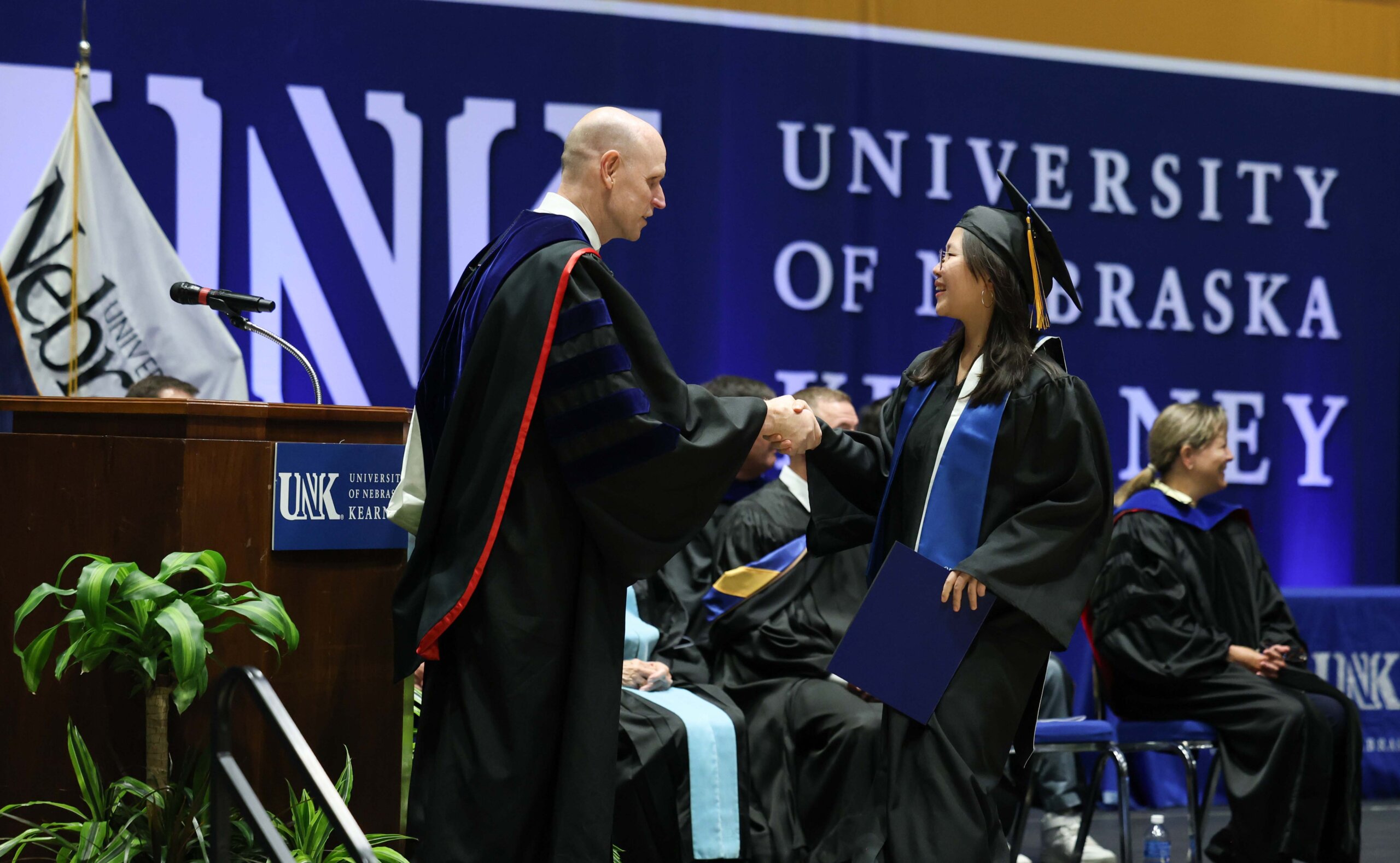 Students participate in summer commencement.