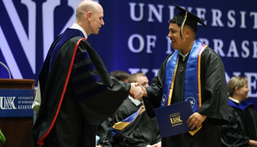 Students participate in summer commencement.