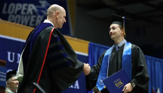 Students participate in summer commencement.