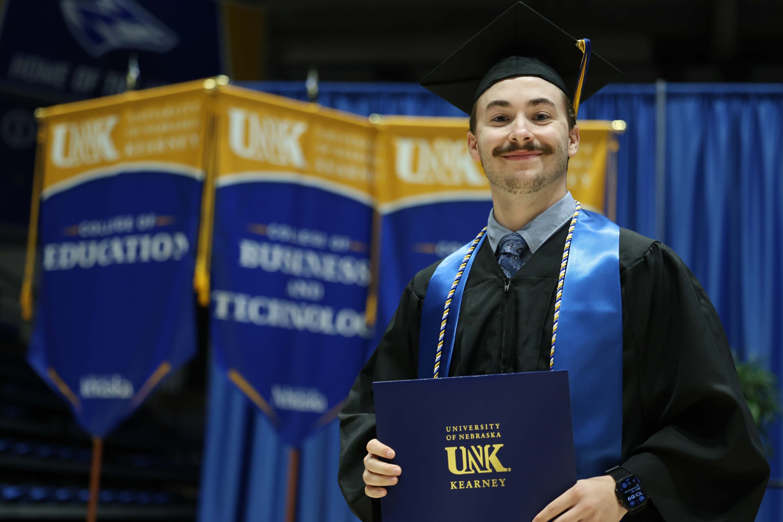 Students participate in summer commencement.