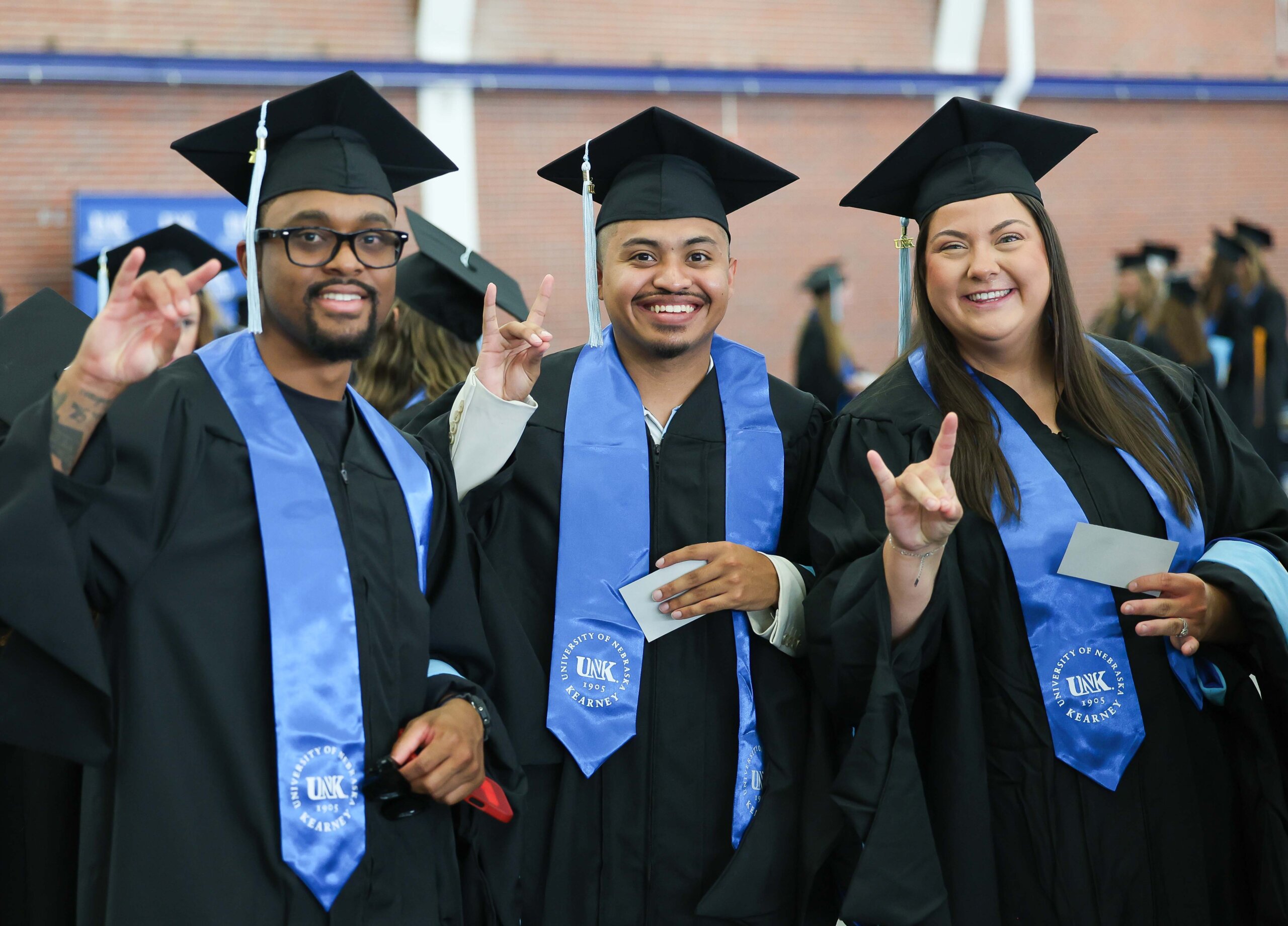 Students participate in summer commencement.