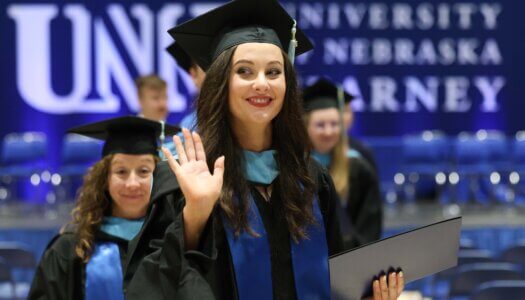 Students participate in summer commencement.