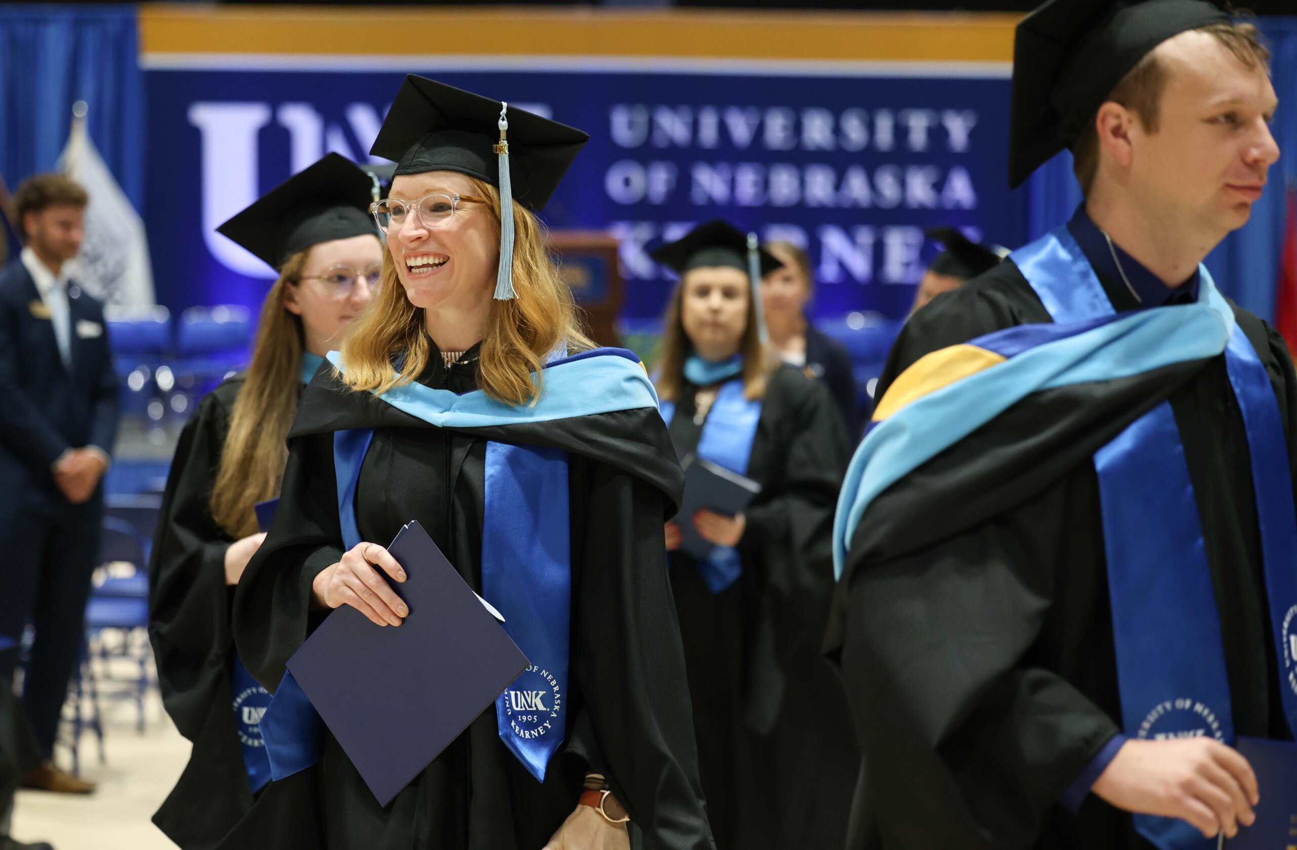 Students participate in summer commencement.