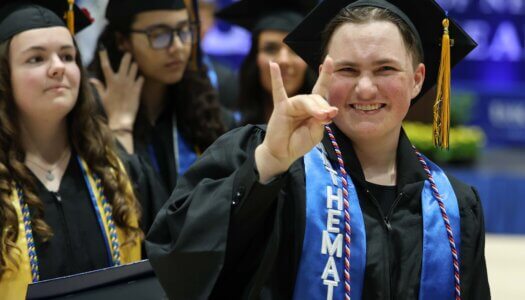 Students participate in summer commencement.