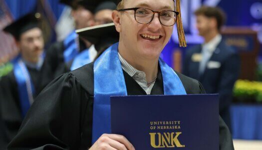 Students participate in summer commencement.