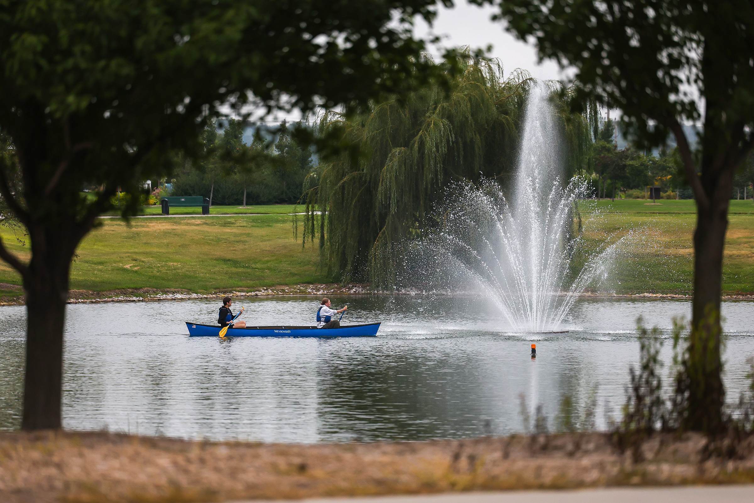 UNK students kayak at Yanney Park during the Loper Lot Party.