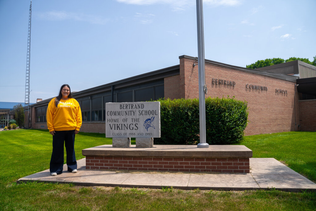 Cheyenne Fitzgerald poses for a photo outside Bertrand Community School.