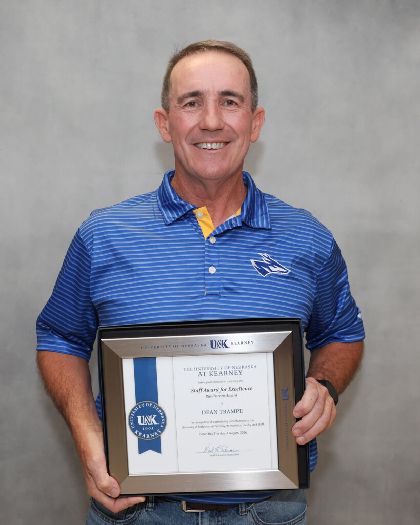 Dean Trampe is pictured with his award