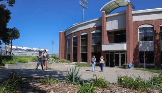 Students walk outside the student union.