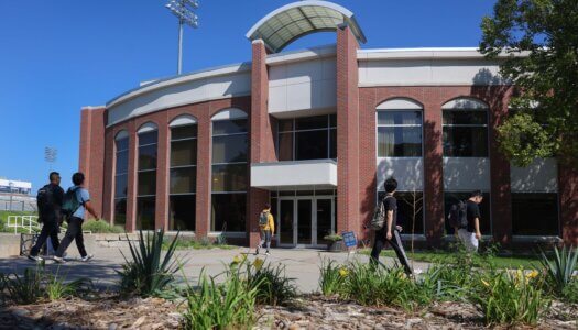 Students walk outside the student union.
