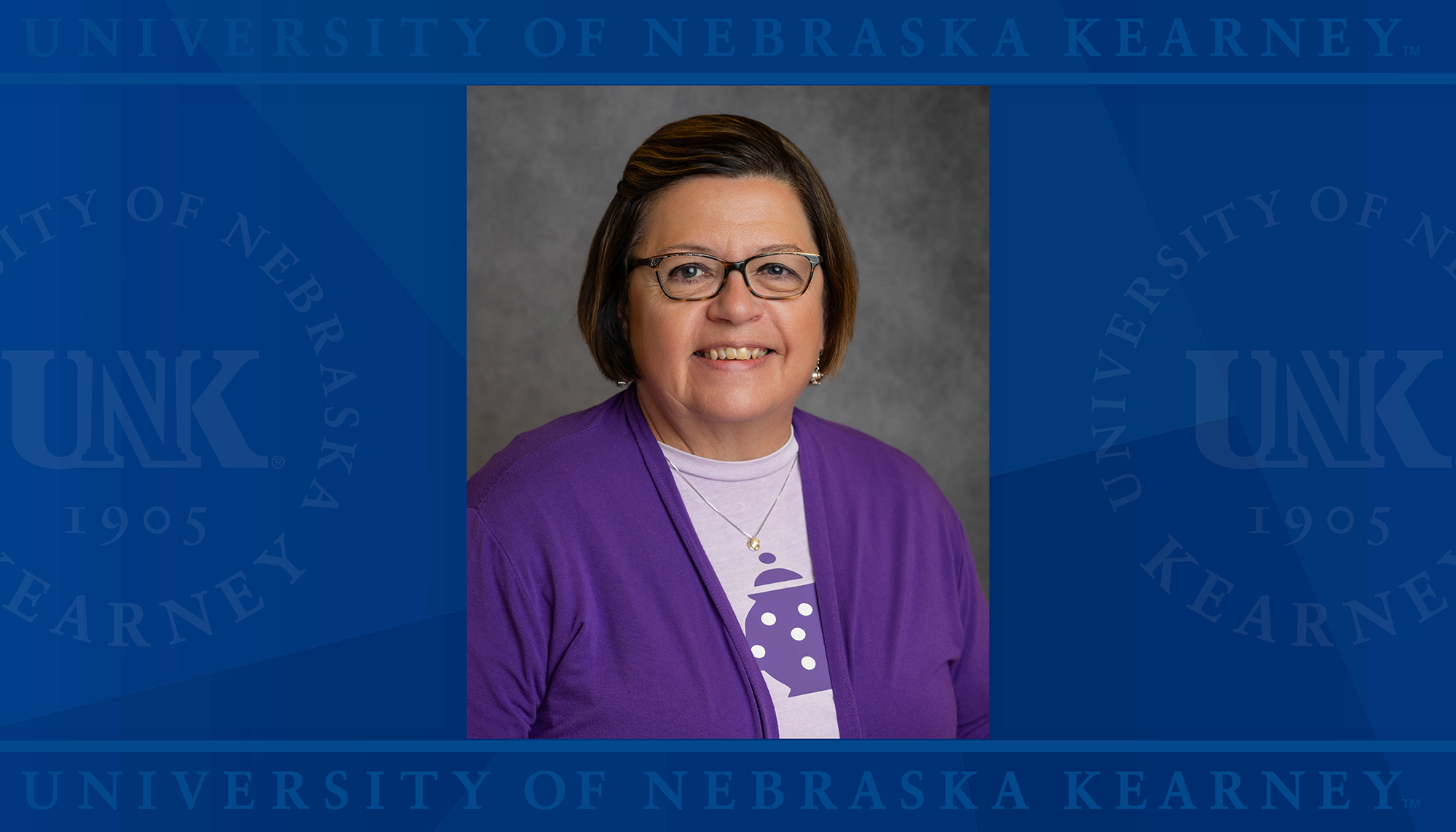 Laurie Anderson headshot over a UNK background