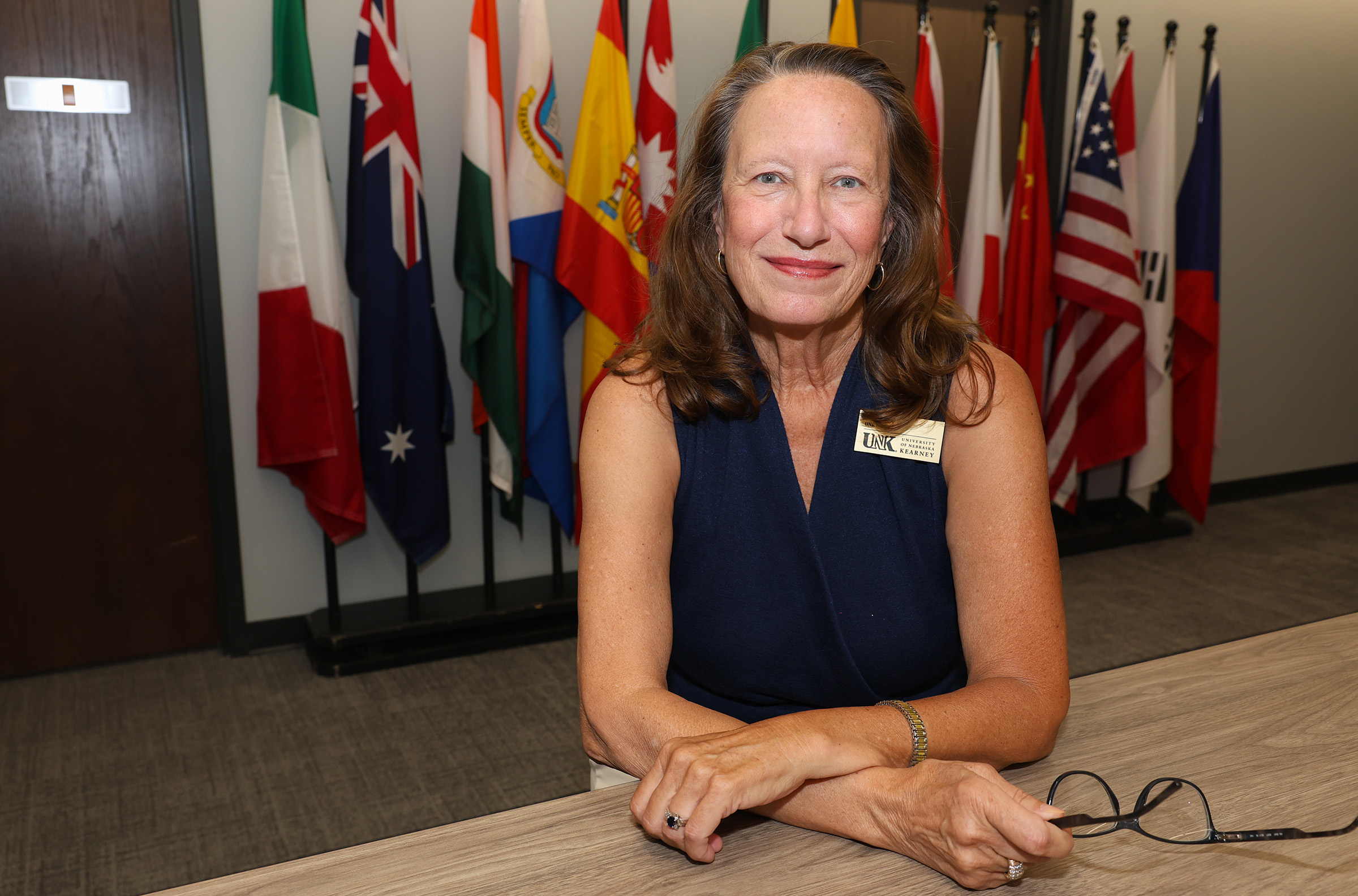 Lisa Terry poses for a photo in the UNK Global space on campus.